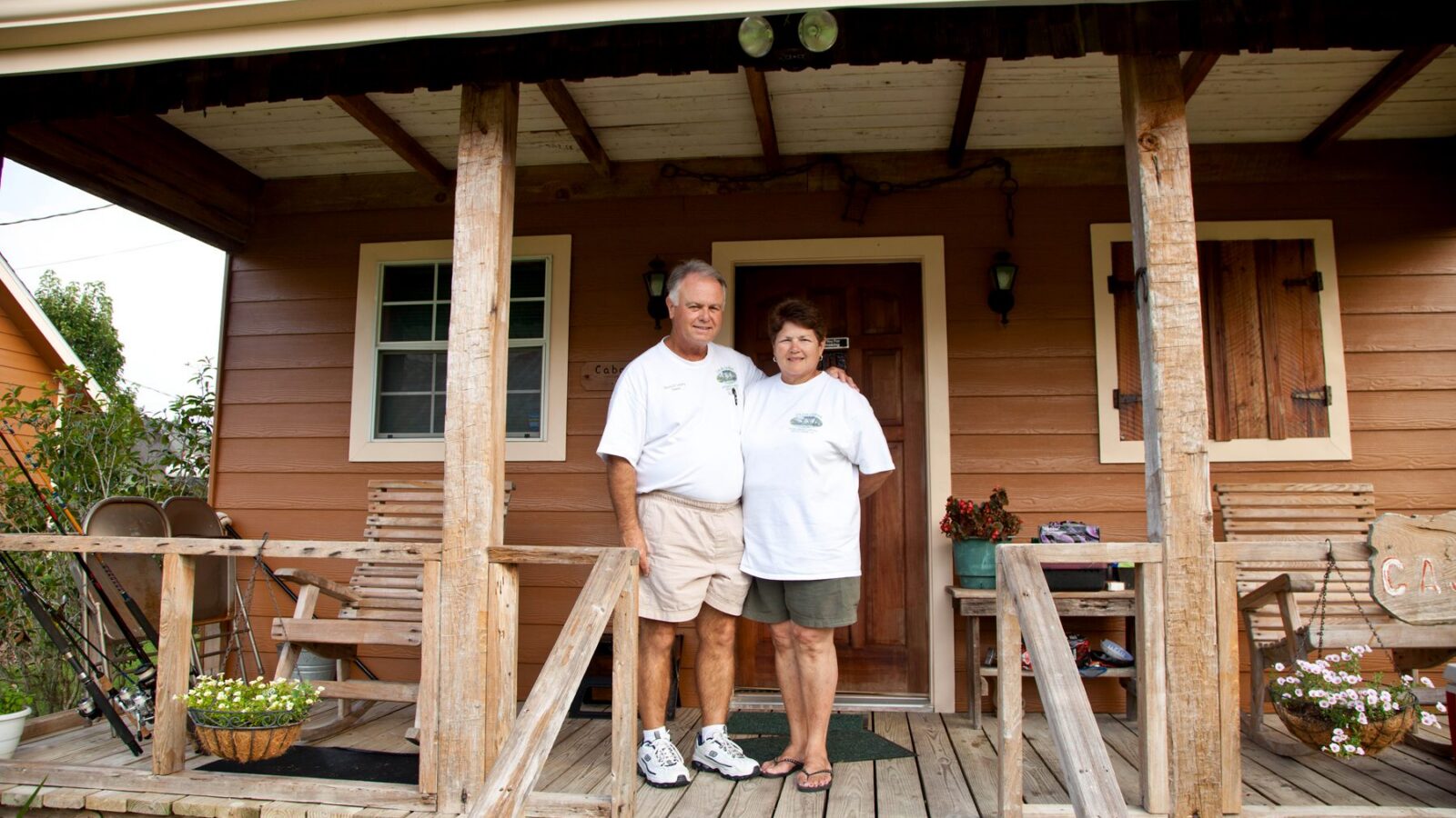 Dennis and Pat Landry on a cabin porch