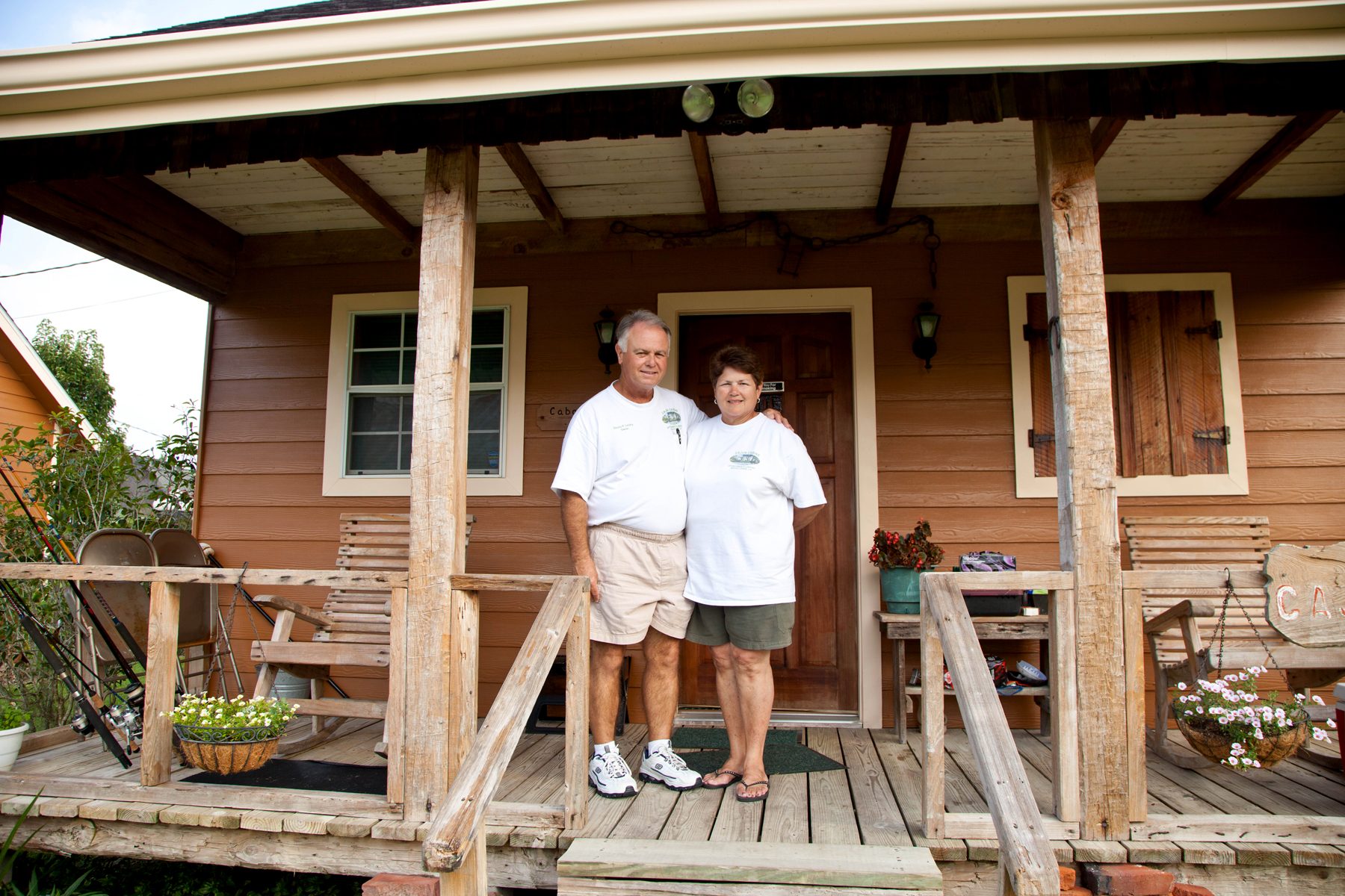 Dennis and Pat Landry on a cabin porch