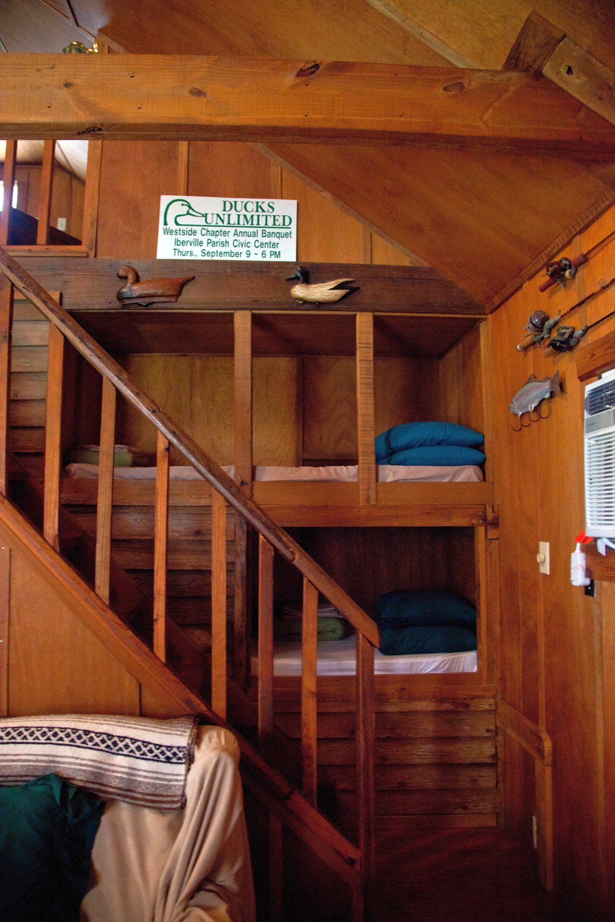 The built-in bunks beside the stairway in La Belle Rose