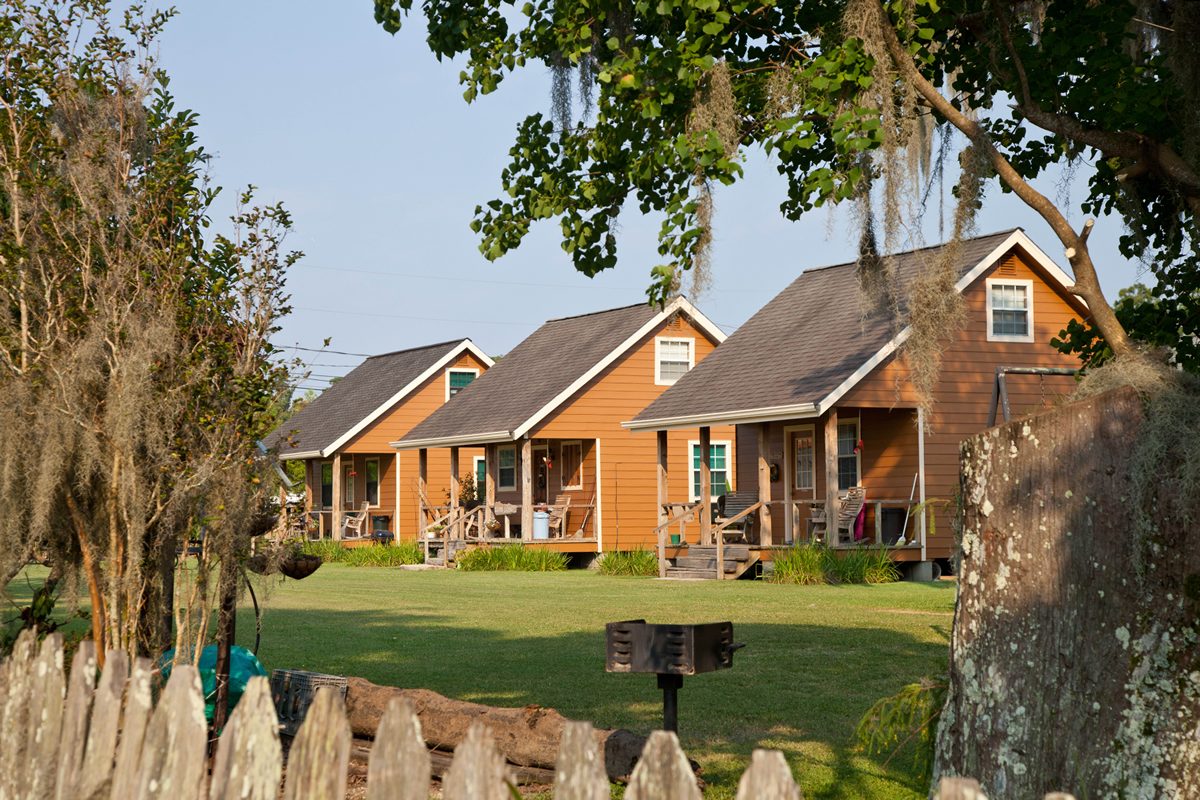 The three cabins side by side on the lawn